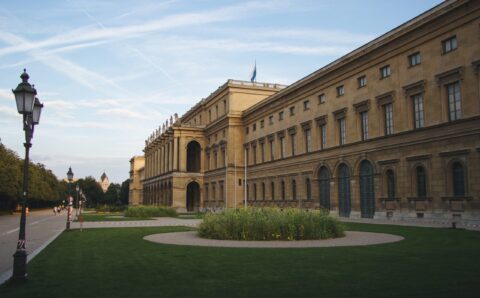 Hercules Hall surrounded by greenery under the sunlight at daytime in Munich in Germany
