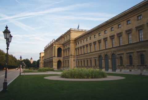 Hercules Hall surrounded by greenery under the sunlight at daytime in Munich in Germany