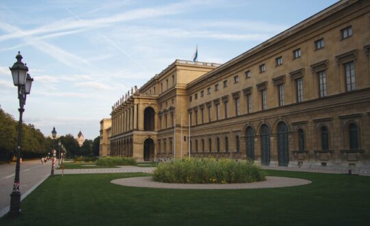 Hercules Hall surrounded by greenery under the sunlight at daytime in Munich in Germany